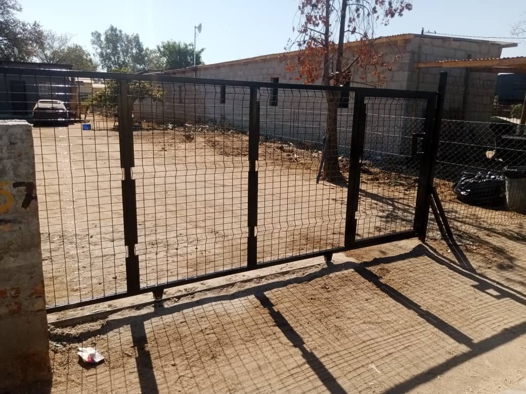 Black ClearVu-style high-security mesh sliding gate — Tshipiworks Gabane